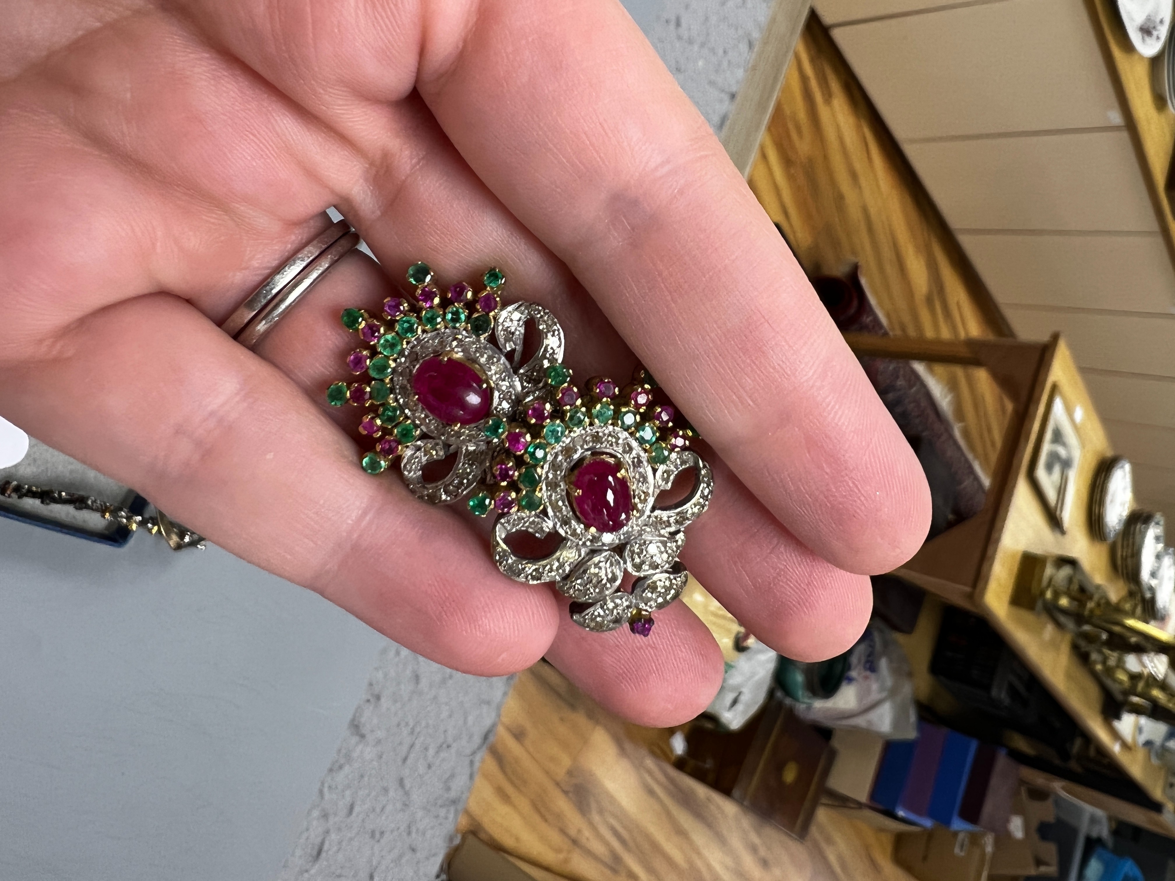 An Indian white and yellow metal, diamond, ruby and gem set necklace, 46cm and pair of matching earrings.